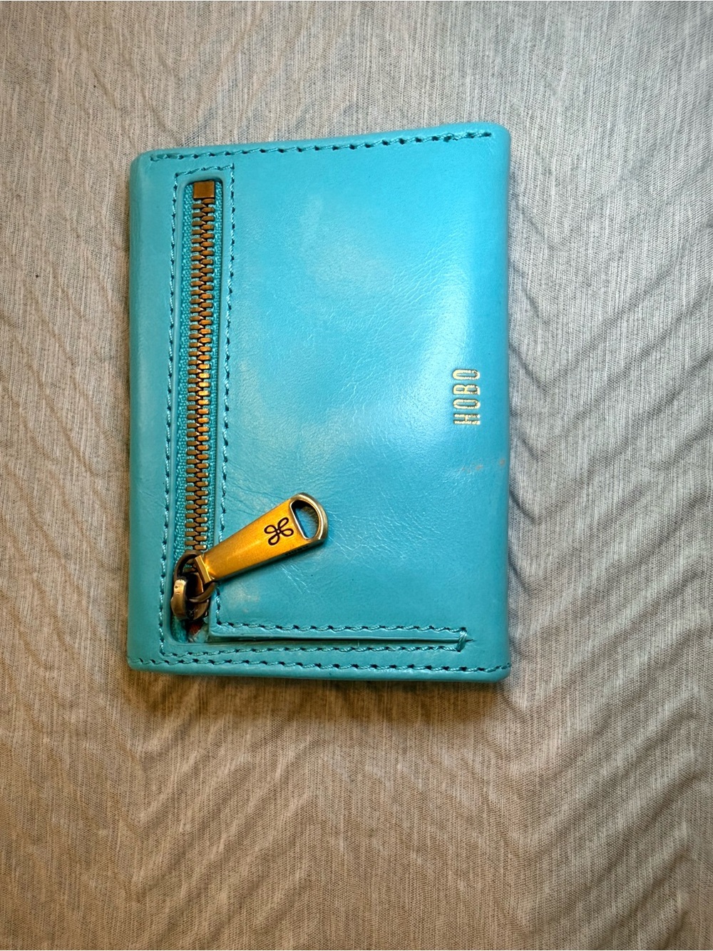 HOBO Turquoise Leather Wallet with Floral Metal Accent - Picture 2 of 3